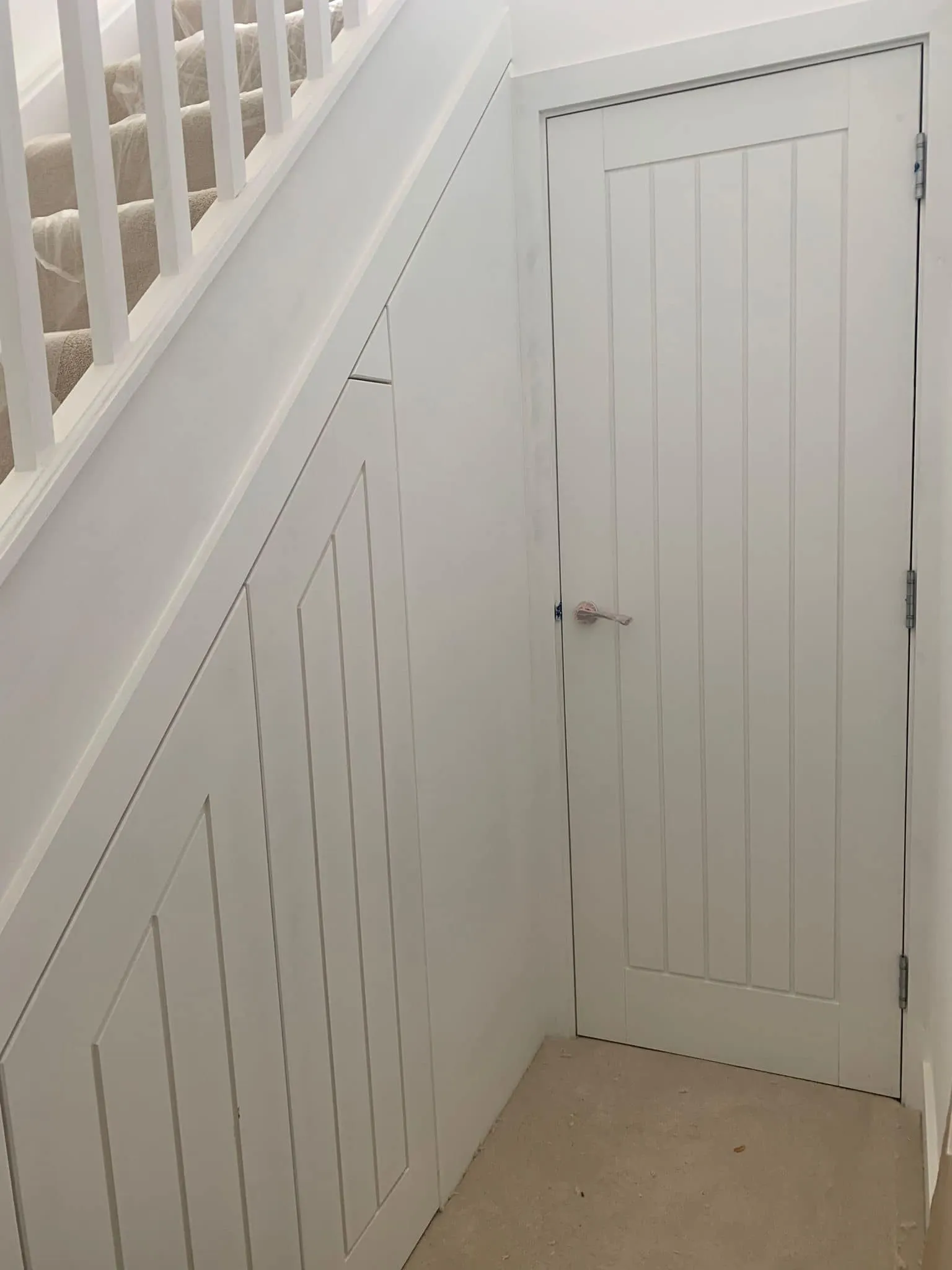 understairs cupboard and door