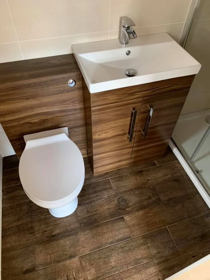 bathroom with wood flooring