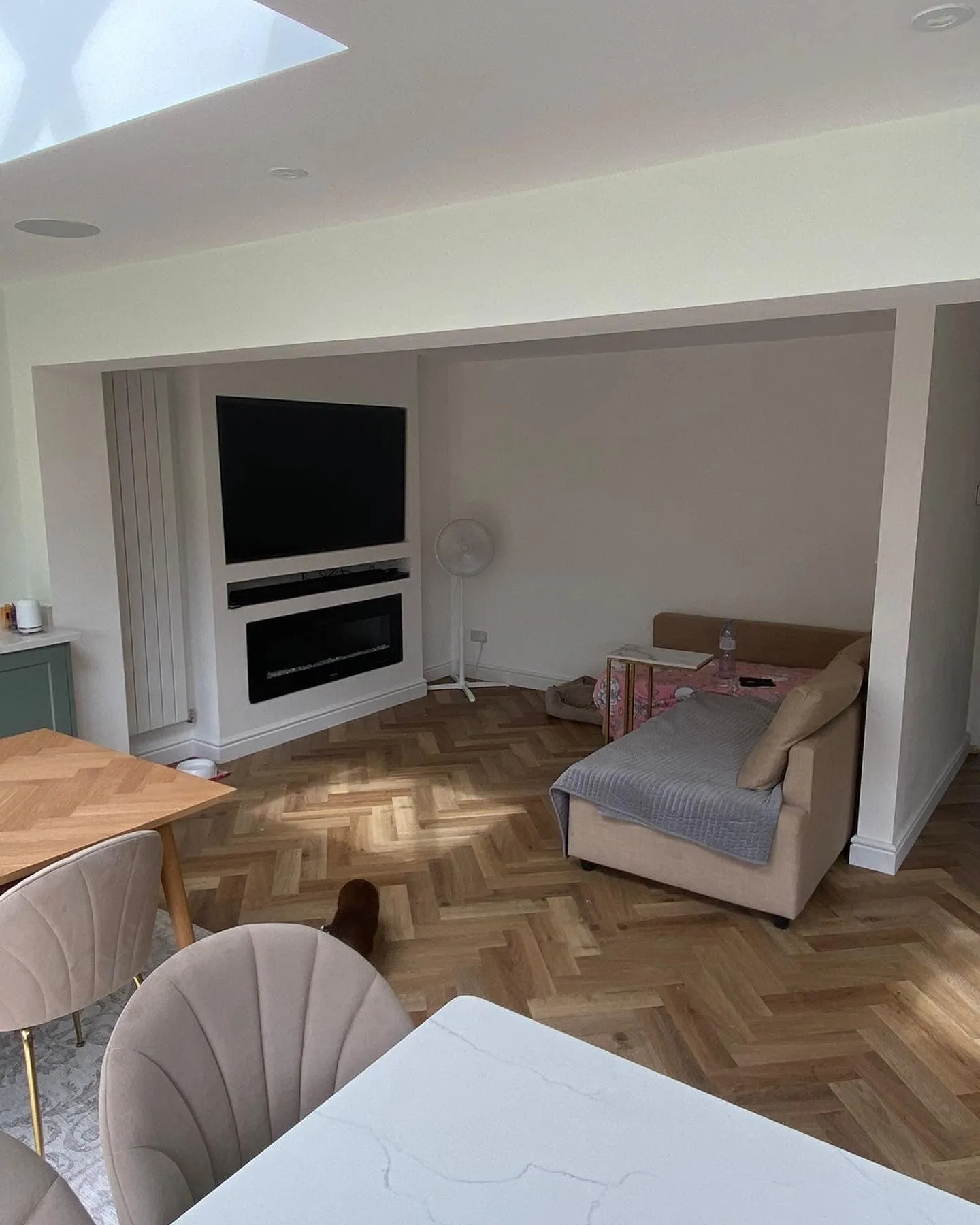 spacious lounge with large tv